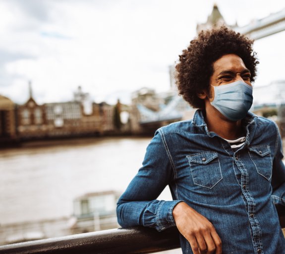 Man standing in london during COVID19